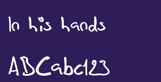 In his hands